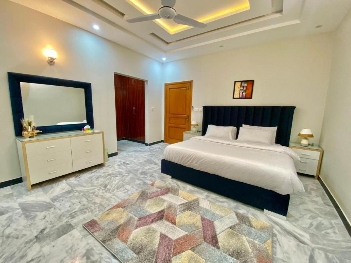 Homey Islamabad Esterno foto