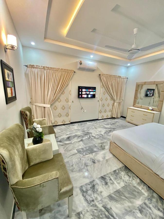 Homey Islamabad Esterno foto