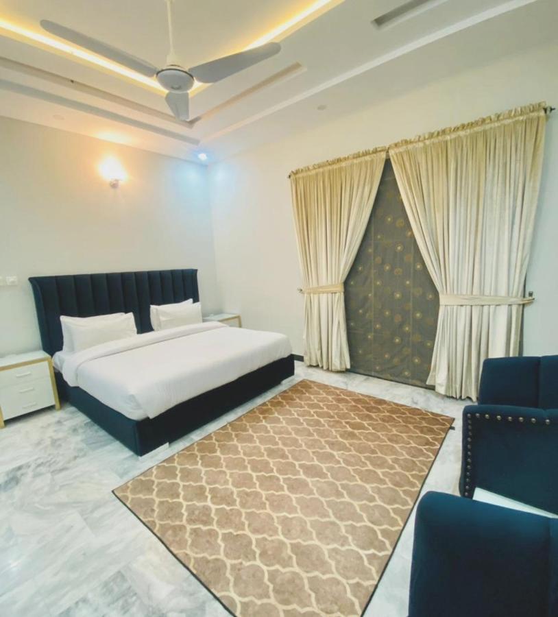Homey Islamabad Esterno foto