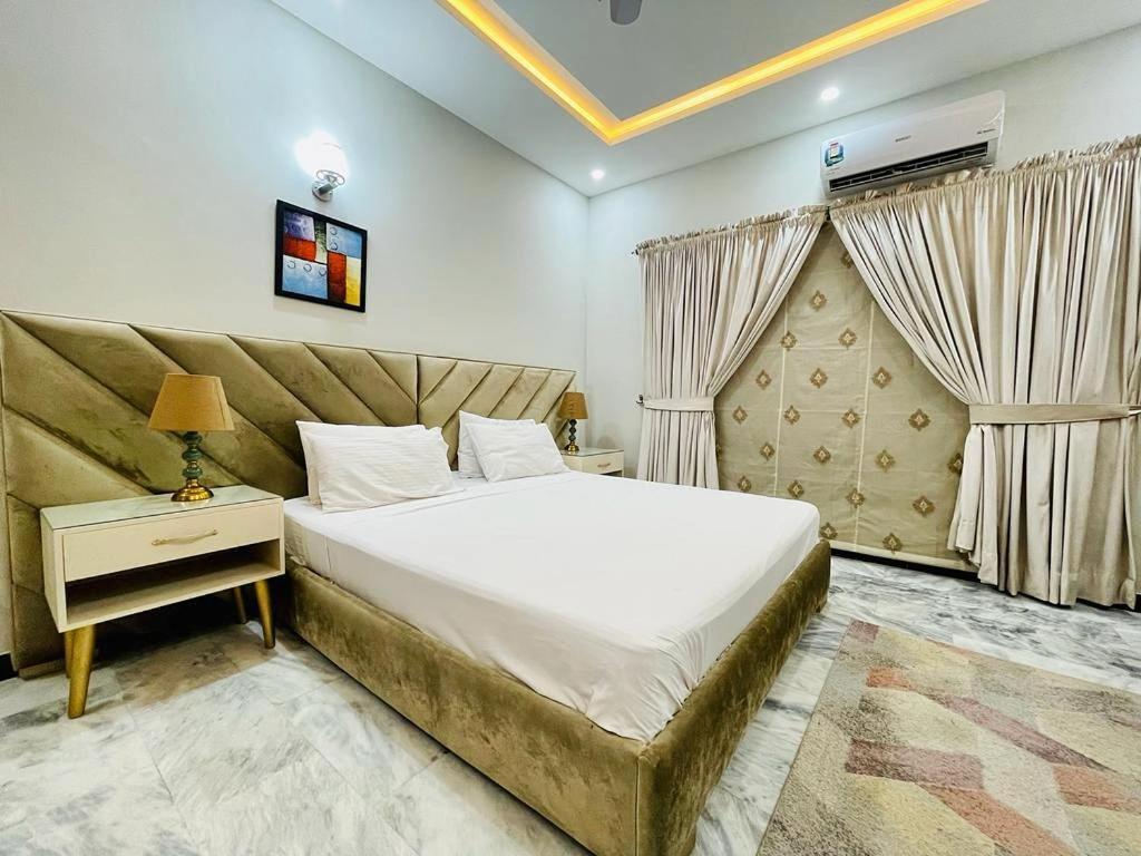 Homey Islamabad Esterno foto